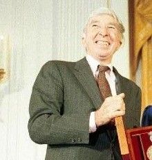 John Hoyer Updike - By derivative work: Grunge6910 (talk) John_Updike_with_Bushes.jpg: Grunge6910 (John_Updike_with_Bushes.jpg) [Public domain], via Wikimedia Commons